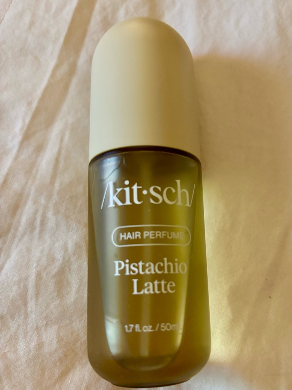 Kitsch Pistachio Latte Hair Perfume — Pale Green Cap & Olive Bottle